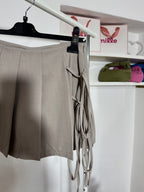 Gonna pantalone lacci