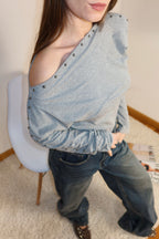 Maglia asimmetrica borchie