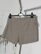 Gonna pantalone lacci