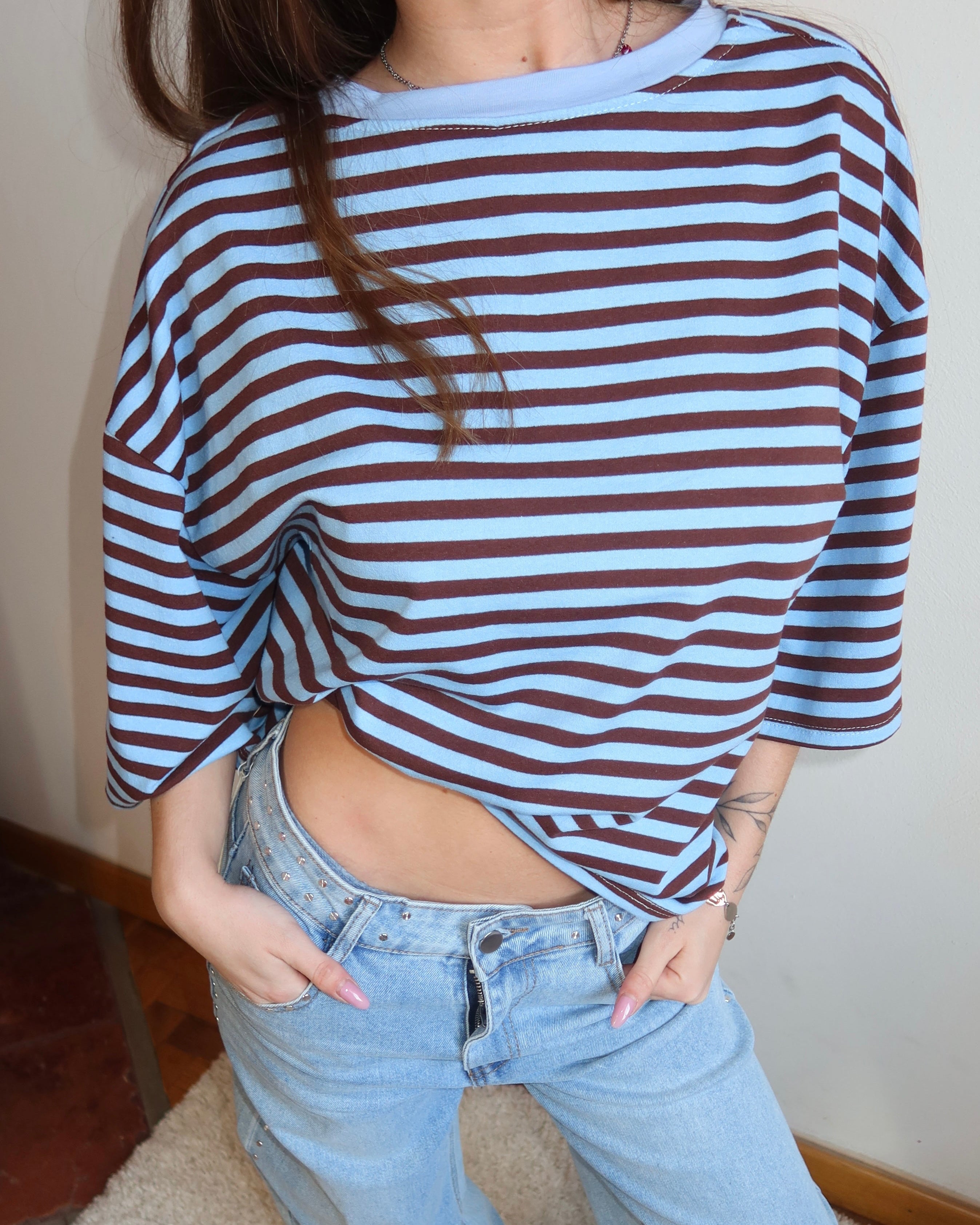 Maglietta a righe mezze maniche