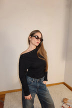 Maglia asimmetrica borchie