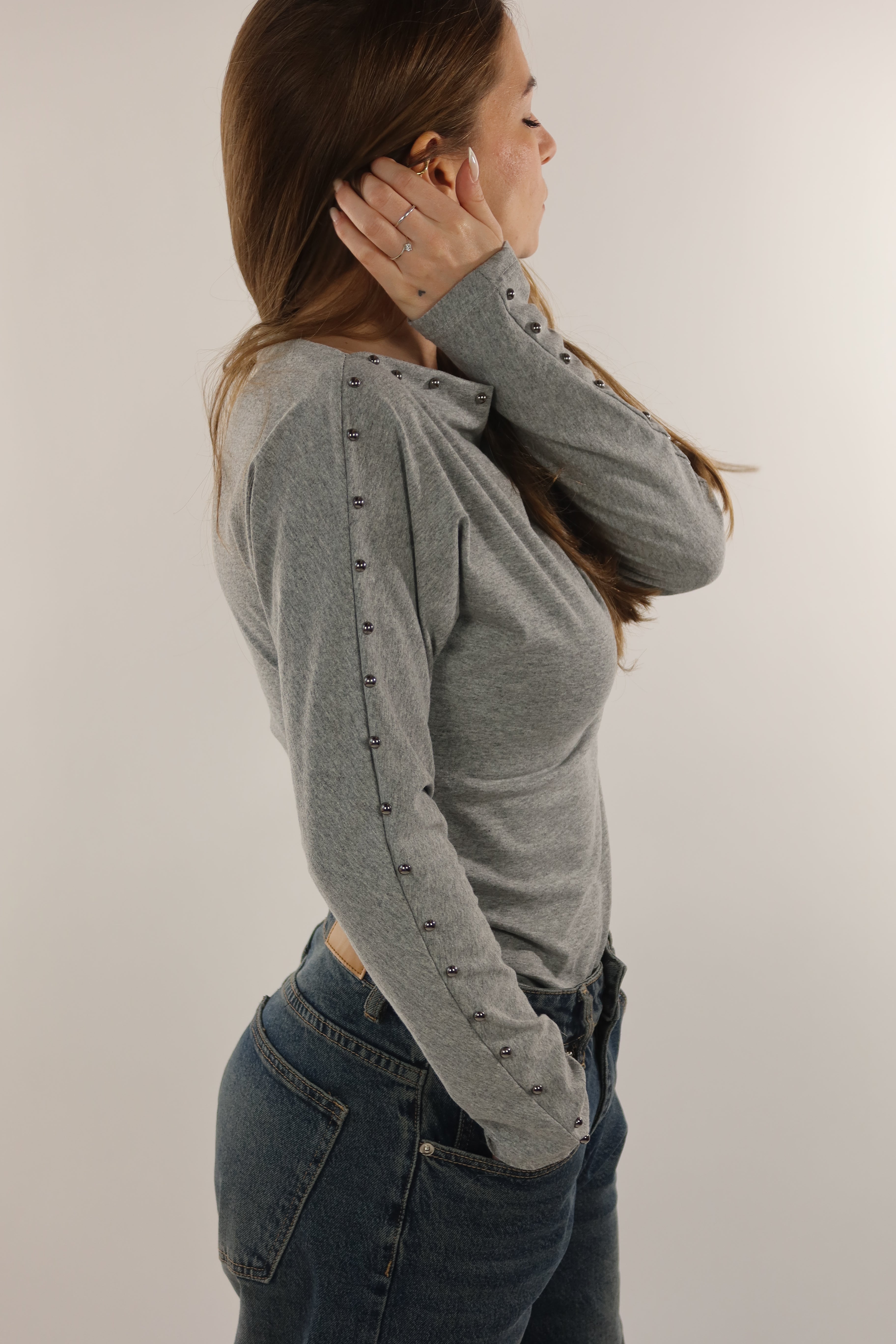 Maglia asimmetrica borchie