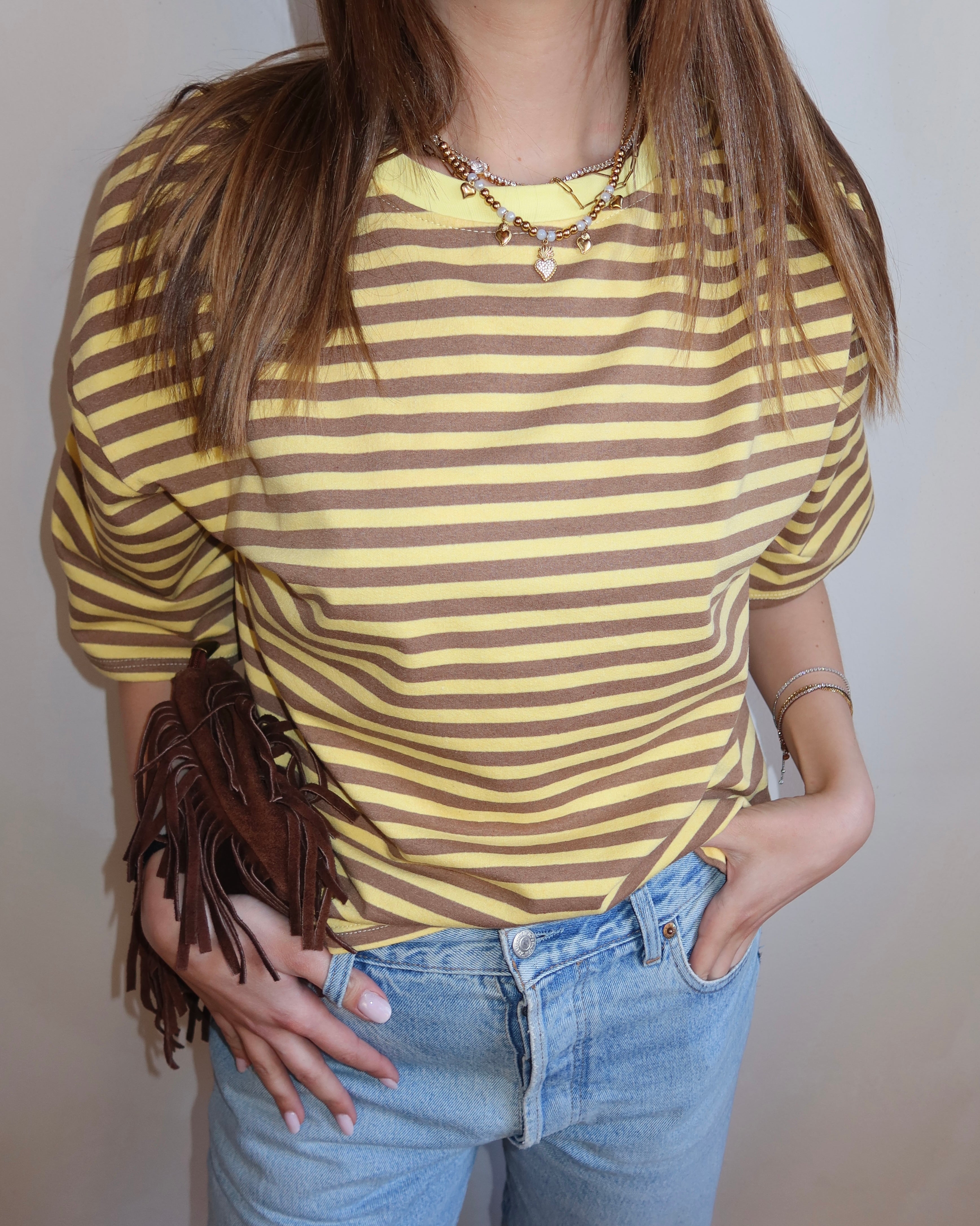 Maglietta a righe mezze maniche